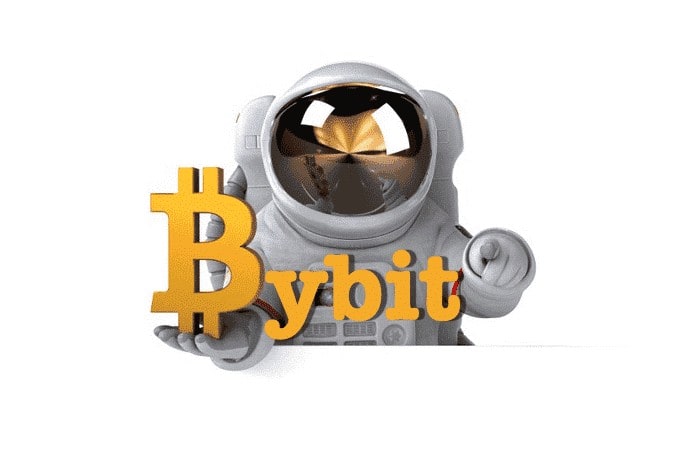 A cartoon astronaut in a white spacesuit is pointing towards the viewer. The astronaut holds a large stylized Bitcoin symbol followed by the text "bybit" in orange letters. The background is plain white.