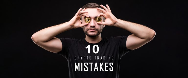 A man holds two physical Bitcoin coins in front of his eyes, resembling glasses, against a black background. The text reads "10 Crypto Trading Mistakes" in white capital letters.
