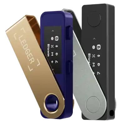 Three Ledger hardware cryptocurrency wallets in gold, blue, and black stand slightly overlapping, their small screens displaying Bitcoin-related text—a secure choice as the MiCA Deadline July 2026 approaches.